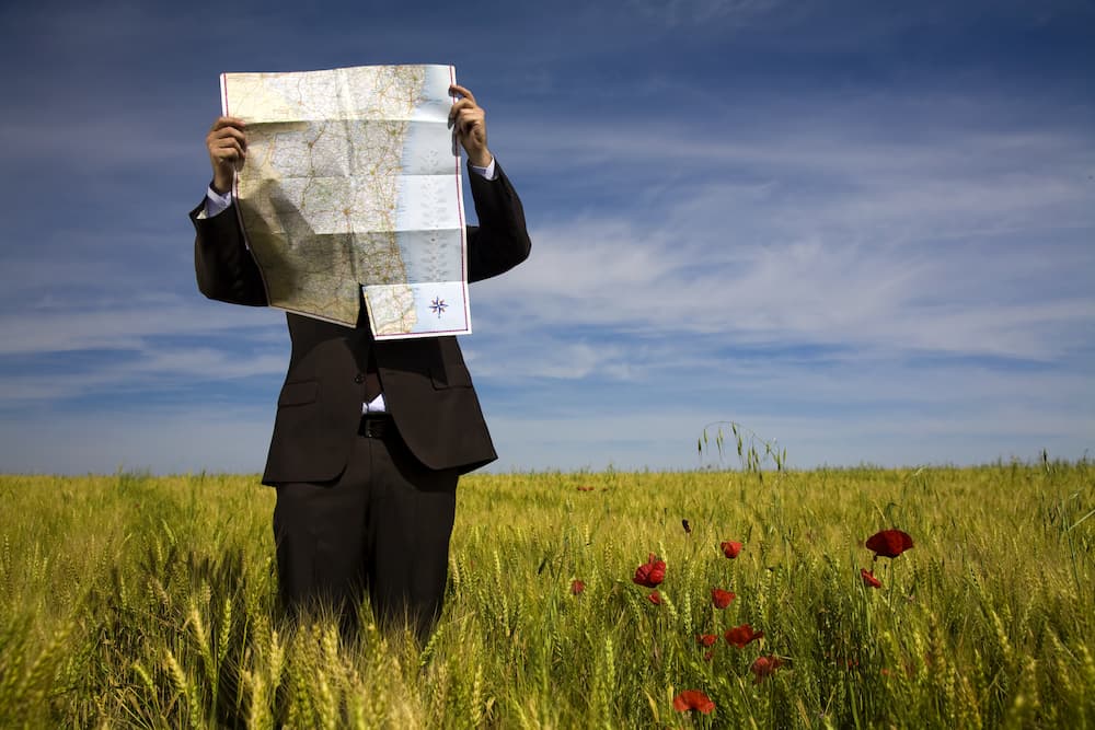 A man holding up a map